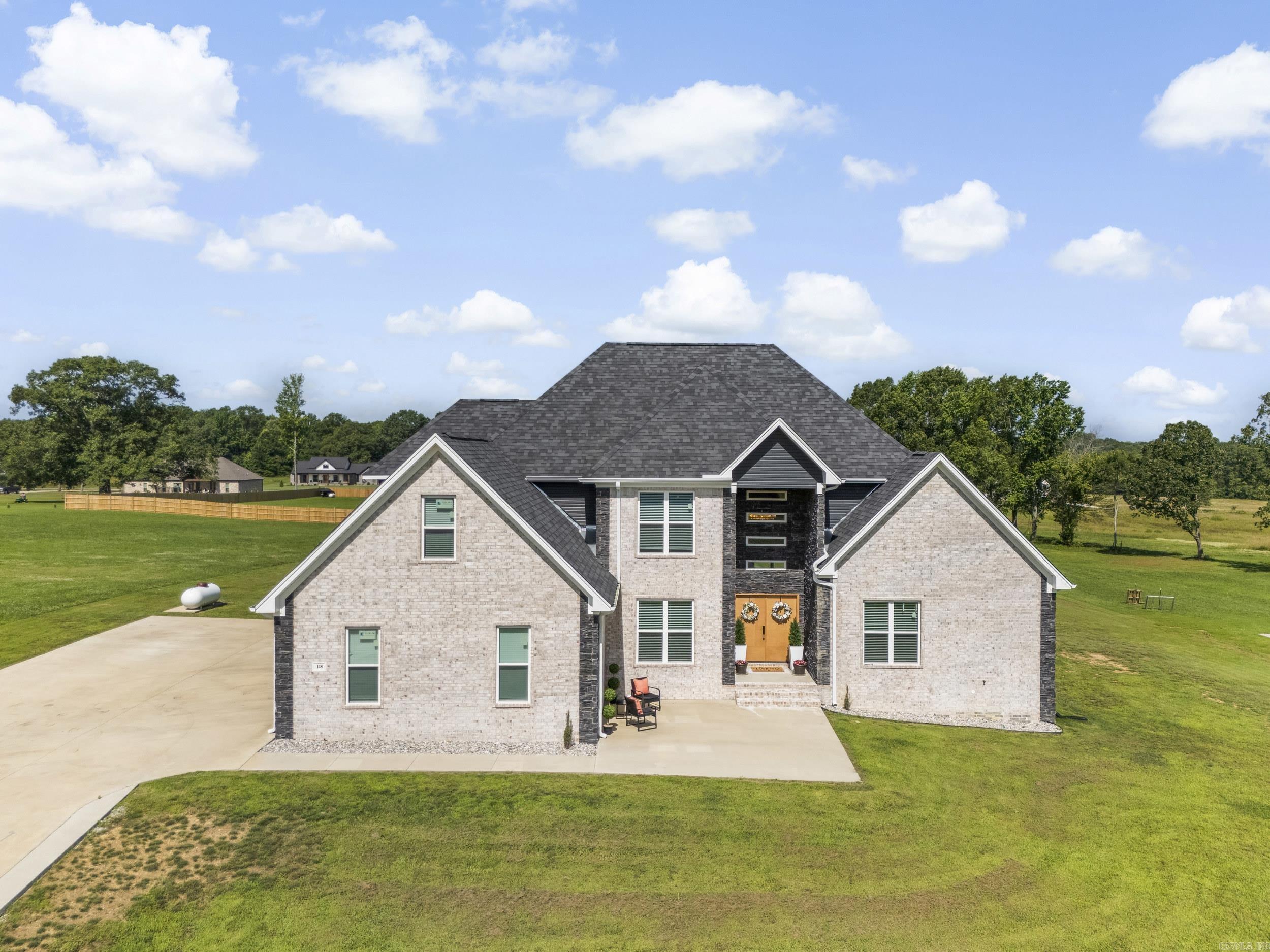 Stunning 5-Bedroom Home on 1.41 Acres Welcome to this beautifully designed home nestled on a spacious 1.41-acre lot, offering the perfect blend of luxury, comfort, and functionality. Boasting 5 bedrooms and 3.5 bathrooms, this home provides ample space for family living and entertaining. The heart of the home features a chef-inspired kitchen with GE CafĆ© appliances and two large islandsāone dedicated to prep and storage, and the other offering additional storage and seating for six. Elegant lighting throughout the home adds a sophisticated ambiance. The primary suite is a true retreat with a luxurious spa-like bathroom, designed for relaxation and comfort. A bonus room offers flexible space for a media room, playroom, or home office. A safe room is also included for added peace of mind. Set on a peaceful lot, this home combines upscale finishes with thoughtful design in a serene country setting. Itās truly a must-see! AGENTS SCHEDULE THROUGH BROKERBAY.