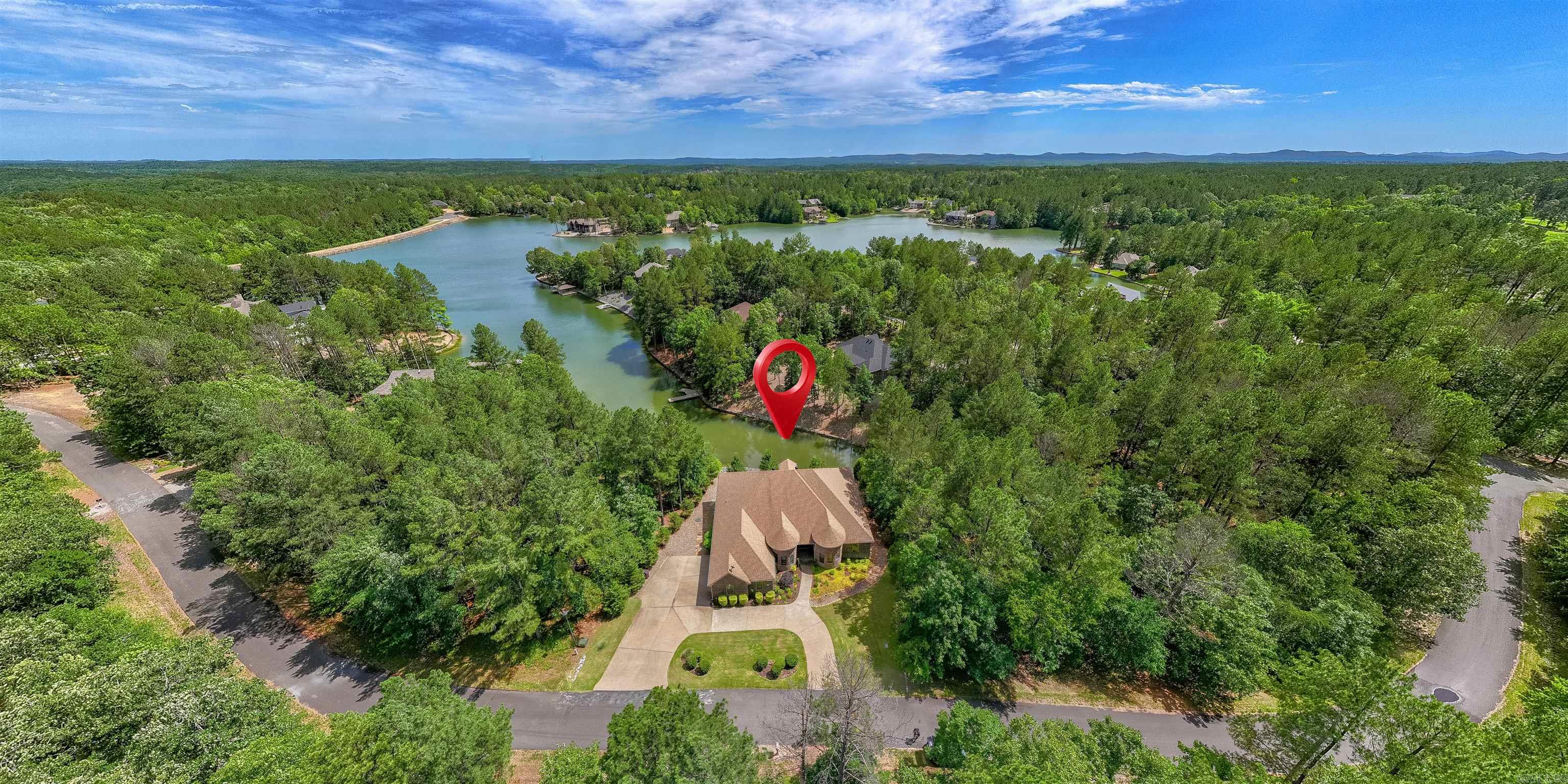 Lakefront Mediterranean Villa on Granada Lake ā A Showpiece of Style and Serenity Welcome to your dream custom-built, single-story lake home that radiates timeless elegance and luxurious comfort. Nestled on the shores of Granada Lake, this show-stopping villa feels like something straight out of a movie set, where every detail was designed with sophistication and functionality in mind. 2 Primary Suites for Elevated Comfort: This home offers two spacious primary bedrooms, each with its own private en-suite bath and walk-in closets. ⢠The 1st suite features double vanities, built-in closet systems, a spa-like copper soaking tub, & a separate walk-in shower for the ultimate in relaxation. ⢠The 2nd suite includes its own elegant bathroom with a walk-in tiled shower and built-in closets, ideal for guests or multigenerational living. Gourmet Chefās Kitchen: ā¢Granite counters, French chef oven, Walk-in pantry with abundant storage Entertainment-Lifestyle Spaces: ā¢The media room features a drop-down large screen & reclining theater seating. ā¢The home office provides a quiet space, or also may be used as a 4th bdrm. ā¢Enjoy the sunroom for views of the lake day/night for relaxing.