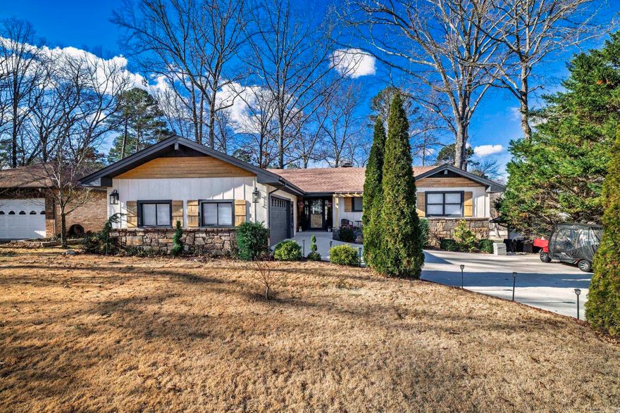 Must see this totally remodeled and updated Desoto Golf Course home. Enjoy the golf course views from the gazebo on the spacious deck.  Drive your golf cart to the Desoto Golf Course, restaurant, pickleball courts, miniature golf course, and outdoor pool! Features include large kitchen bar, pantry, laundry room and many other beautiful updates!  Hot Springs Village has a one-time buy-in fee of $2,000 paid at Closing.