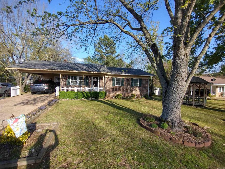 This lovely home is located within city limits on a quiet street, making it ideal choice for those looking to downsize or purchase their first home, featuring a spacious 12x20 storage building.