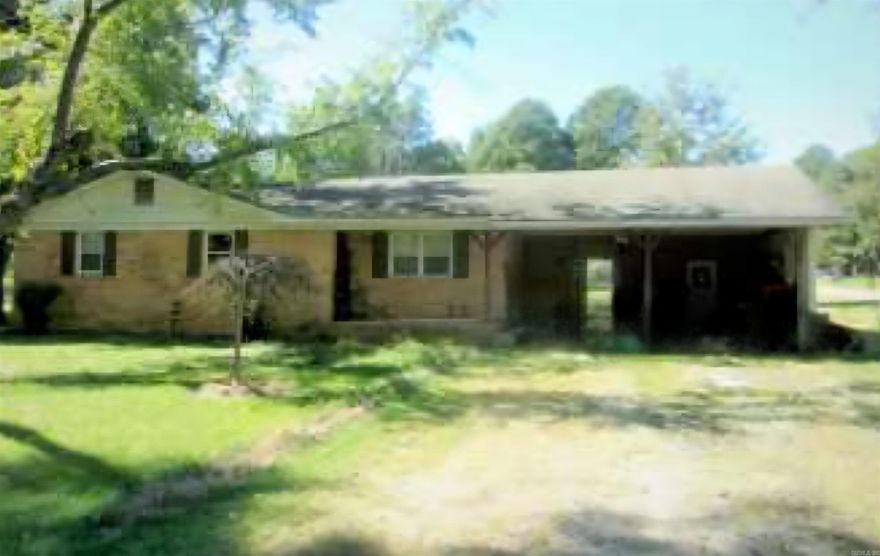 Brick home in Rector Arkansas 3 bed 2 bath with double carport. Fixer upper home. Has some floor issues and no heat in home.