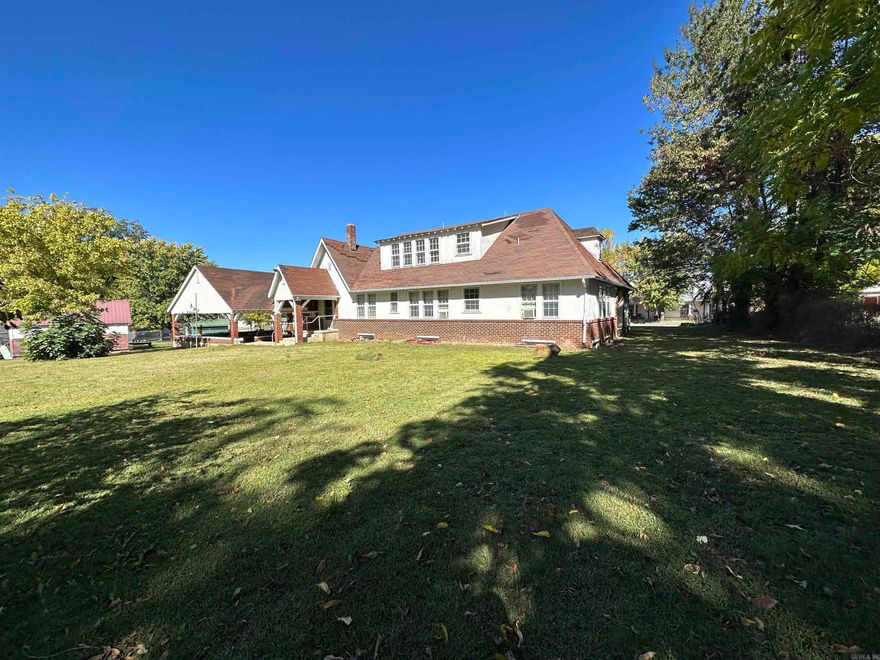 This property boasts a spacious 2,176 square feet of living space on the main floor, complemented by a full unfinished basement that offers potential for expansion or ample storage. The main floor features three bedrooms and two full bathrooms, providing comfortable living space for a family. Additionally, a fourth bedroom with its private bathroom can be found upstairs, adding versatility to the layout. Cedar-lined closets add a touch of luxury and functionality. Outside, the property offers a covered patio, a two-car carport, and a convenient storage shed. Situated on a generous 1.25-acre lot in the heart of town, this location presents intriguing possibilities. Its central position makes it a promising candidate for an Airbnb rental or even a commercial business venture. The substantial land size allows for outdoor amenities or potential future development. Whether for residential living or entrepreneurial pursuits, this property's combination of size, amenities, and location opens doors to a variety of opportunities.