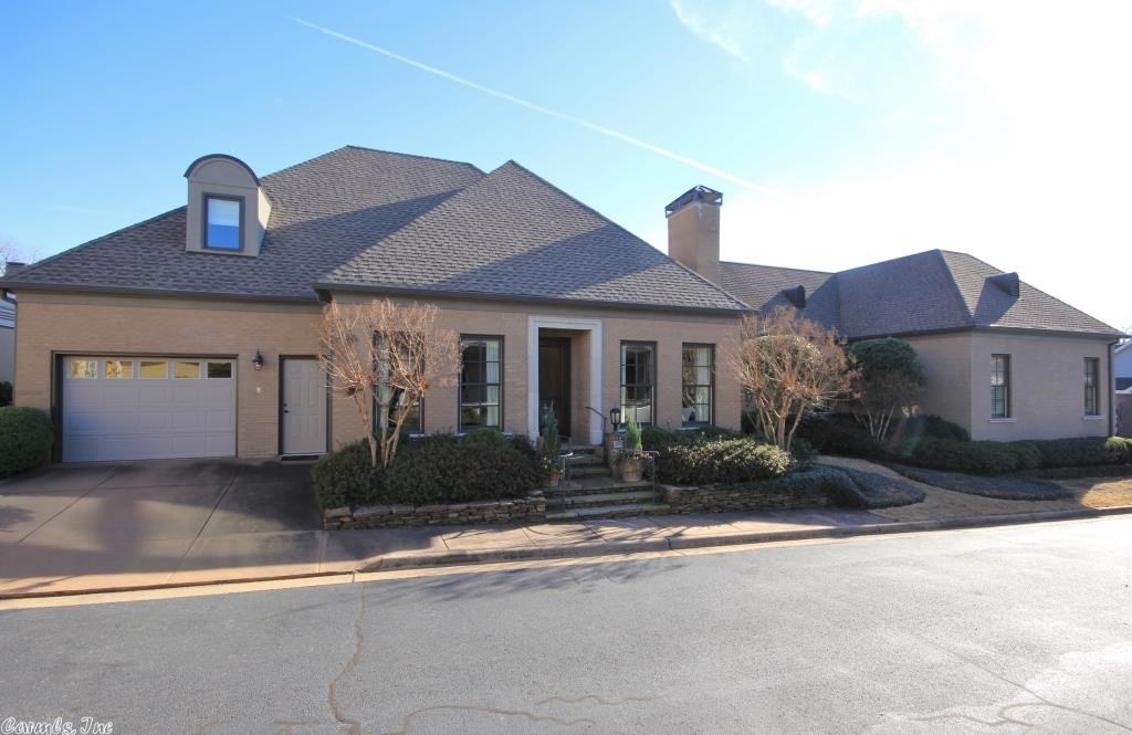 Fabulous custom home with high ceilings and river views.  4 fireplaces, spacious screened porch with heaters.  Master suite with his and hers baths, his and hers offices, two bedrooms down and two bedrooms up.  Jack Hartsell did the remodel and extensions in 2005-2006.  Sits on two lots.  Has a two car garage and a 1 car garage. Very lovely home. See agent remarks for exclusions.
