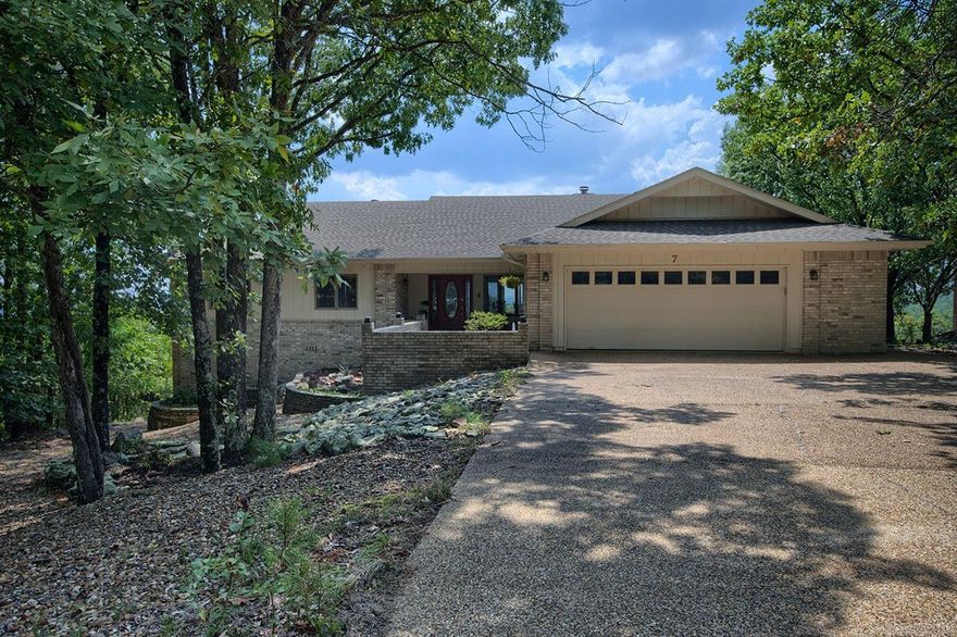 YOUR OWN MOUNTAIN RETREAT! Enjoy breathtaking mountain views from the  expansive deck and almost every room of this 4 bedroom/3 bath one level updated home.  Special features include luxury vinyl plank flooring in main areas, new high efficiency furnace, 2 water heaters, relaxing guest suite, cozy den with fireplace and adjoining breakfast bar, chef's kitchen with gas range, double wall ovens, and pantry. The hobbyist will be thrilled with the large workshop and  storage area below! The primary suite is a peaceful oasis including a private entrance onto the deck and a luxurious bath. Pamper yourself in the ensuite bath featuring a new heat regulated jacuzzi tub, updated walk-in shower, thermostatically controlled tile flooring, and indirect mood lighting.  Whether entertaining guests, caring for family, or simply enjoying nature and relaxing, this glorious home is the perfect place from sunrise to sunset with its amazing amenities and panoramic mountain vista! Make it yours today!