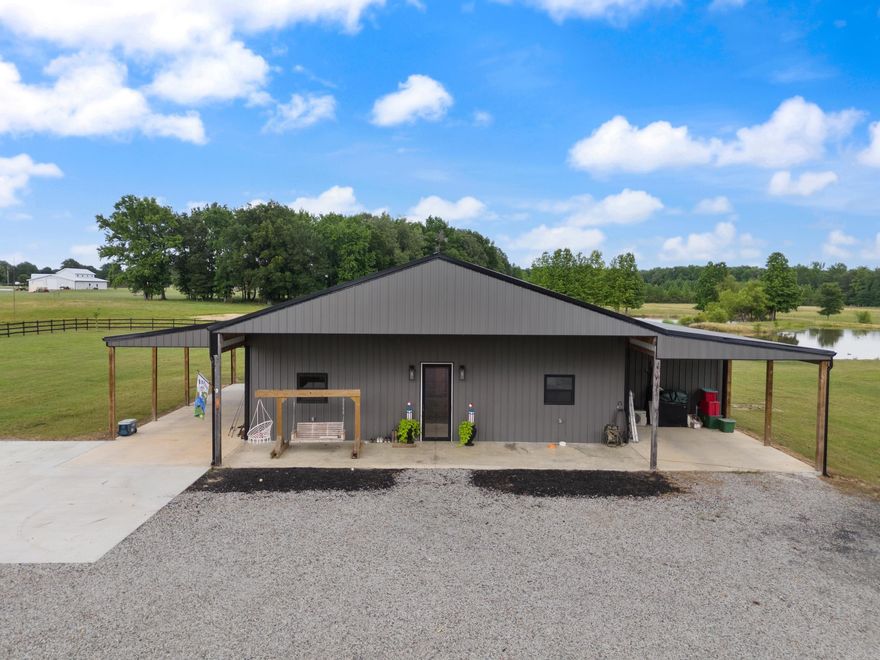 Welcome to your dream home! This beautiful, custom built Barndominium on 20 acres offers the dream Arkansas lifestyle you've been looking for. Complete with your own stocked pond a 30X60 shop that includes 30X30 inside and a 30X20 pull-in for boats/tractor and a 30X10 stall area. Home has spray foam insulation for efficiency, sealed concrete floors, custom cabinets, and so much more! Wait until you see it in person. Schedule your showing today!