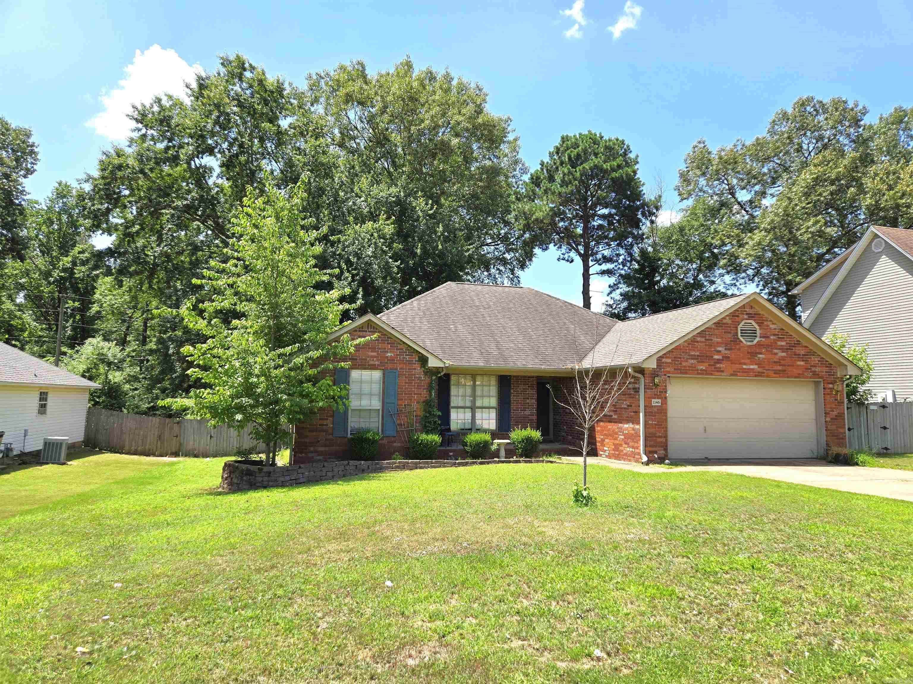 Adorable 3 bedroom/ 2 bath in the heart of Benton, in need of a new family to make it their home. Large fenced-in back yard, with a small deck off the kitchen/dining room. This home has tons of potential with your finishing touches. New hot water heater and smart garage door opener. Large master bedroom. Master bath features double walk-in closets, whirlpool tub and tiled walk-in shower. In addition to the laundry room, there are two pantries for ample storage space. Text Listing Agent today for your private showing.