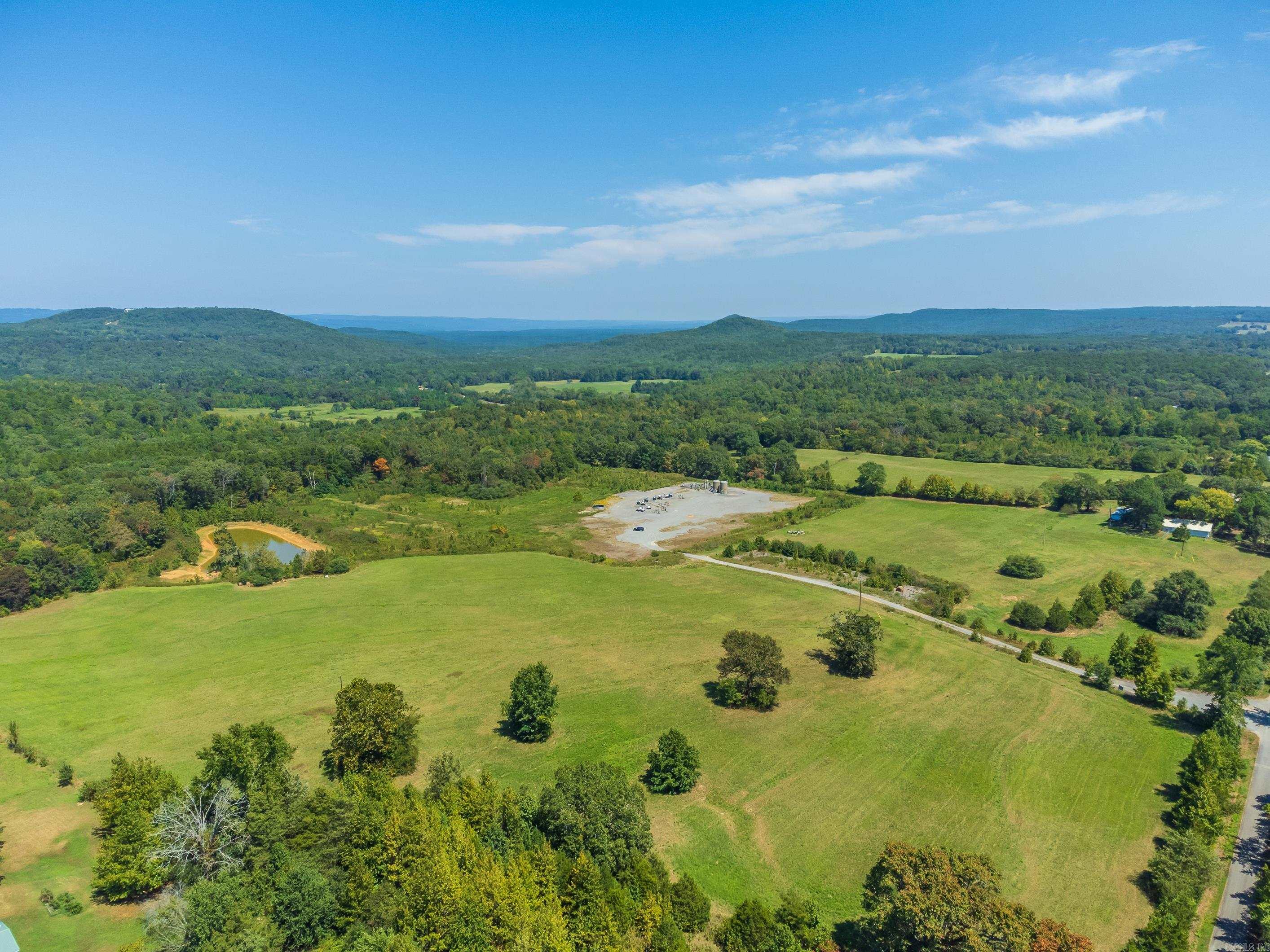A picturesque expanse of lush pasture land stretches out amongst this 37.98 acres M/L, tract of land. Nestled within this serene landscape is a pond that's perfect for your livestock. A small portion of the property still has timber. There is already a driveway into the property and utilities are available at the road. This beautiful property is less than 6 miles from Sugar Loaf Park & Greer's Ferry Lake!!! There is a natural gas pad on this property that takes up approximately 3 acres. Mineral rights do NOT convey.