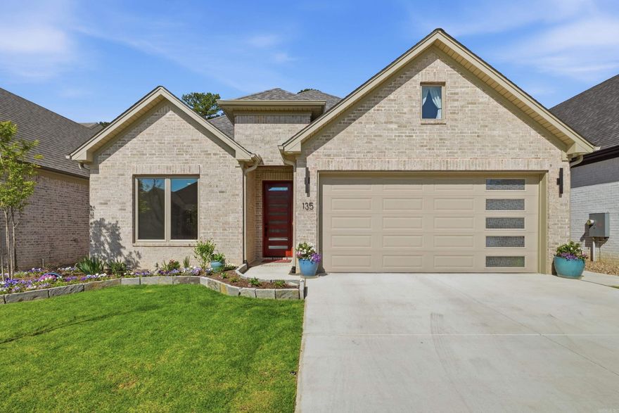 Welcome to your custom-built dream home tucked away in a quiet neighborhood in West Little Rock! This high-end stunner of a home features an open-concept layout that showcases real hardwood floors, solid core doors, dimmable LED lighting throughout, heated floors in the primary bathroom, electric blinds, upgraded fans. Two bedrooms plus an office downstairs  with an additional bedroom and full bath up. Spa-like shower in the primary bathroom completed with a micro bubble air tub! The completely screened-in porch with fireplace extends your living space outdoors. Additional interior upgrades include two pantries, an electric lift to garage storage, a Generac whole-house generator, 220-volt outlets and so much more! Outside, enjoy easy-care gardens with cement and paving stone walkways that wrap all the way around the house, plus three gates for easy access. Stunning landscape and great walking trails are just steps from your front door, and you’re close to all entertainment with easy highway access. RID maintains front and back lawn every Friday! This house is turn key and ready for it's new owners! Call to schedule your appointment today!