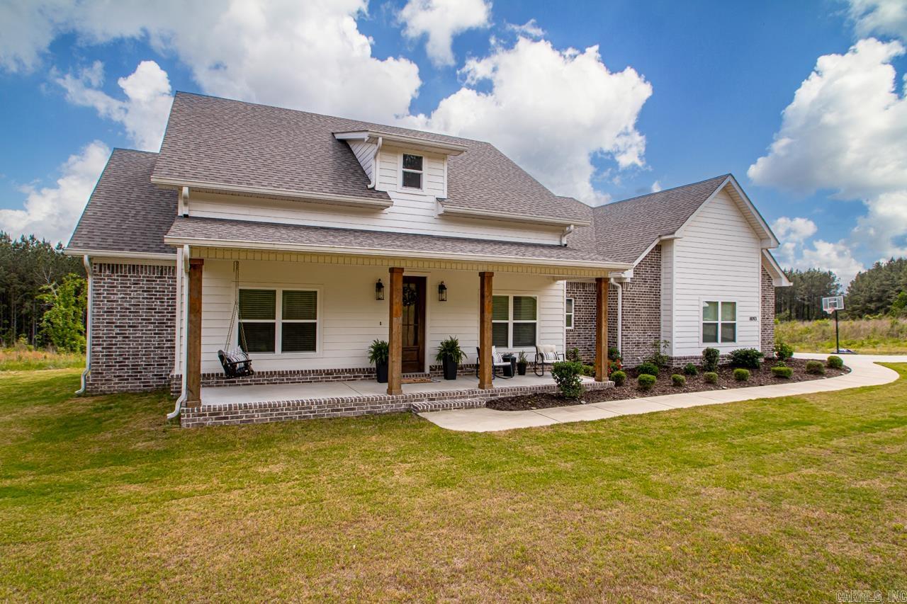 WELCOME HOME! This Beauty is Move IN READY! As you walk into the foyer off of the covered porch, which is a perfect spot to sit on your porch swing, check out the welcoming floorpan this home has to offer. The Office/flex space right off the foyer has many uses. Split plan with 3 bedrooms and a full bath on one side of the home, and the Primary Suite tucked away on the opposite side with a HUGE WALK IN CLOSET, trey ceilings and large bathroom. The living space is perfect for entertaining 2 to 22! Or just relaxing with your family after a long day. Large island, tons of cabinets, oversized walk in pantry with even more storage options! Expansive windows overlooking your 1.5 acres of land! Great mud room area off of garage and half bath. Side entry garage and Extra parking pad