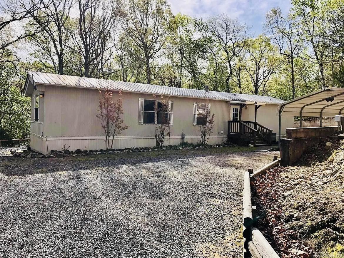 Beautiful, well kept, secluded, 2bed/2bath mobile home on 1.4 acres just 10 minutes out of town! The home has been very well maintained by the previous owners, and comes FULLY FURNISHED! Thoughtfully landscaped with a low maintenance, gravel yard, a decorative pond, year round shrubbery, stone lined paths, and a gorgeous deck, this property is truly an oasis. If youāre looking for a simple, move-in ready home, this one could be it!