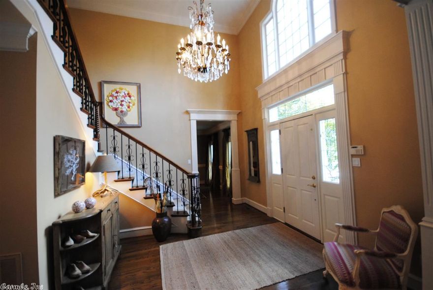 Timeless Georgian Home, built by noted Little Rock builders Regan-Cone. The interior is filled with such architectural delights as hand finished oak floors, classic moldings, 9 ft ceilings and beautiful windows.  The main floor has an open floor plan that allows for comfortable family living and features a large owner’s suite. The second floor is accessed by a choice of two staircases and houses four bedrooms & media or play room. The landscaped grounds includes a pool and cabana bath. Four car garage.