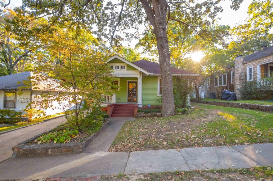 Iconic Hillcrest Craftsman Bungalow nestled on quiet street with extensive updates throughout! Fantastic layout with cozy but open living and dining leading into professionally remodeled kitchen with all new custom cabinets, quartz countertops, matching SS appliances, tile floors and backsplash. High end touches continue in updated bath with jacuzzi tub, as well as newly added additional full bath with walk-in shower. Updated insulated double sash energy efficient windows throughout with 2" wooden blinds. Fabulous level fully fenced back yard with covered and uncovered deck perfect for entertaining.