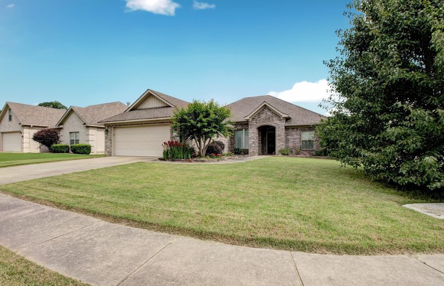 Beautifully Custom Built Home in the East Ridge Addition of Bryant! This corner lot home features gorgeous hand scraped hardwood flooring, professional landscaping, in-ground sprinkler system and Arkansas stone patio! The open floor plan features a large living room/w 10 foot ceilings, extensive wood moldings and WBFP. The kitchen is loaded with custom cabinetry and plenty of counter space. The large Master suite features a trey ceiling, double sinks, walk-in shower, jetted tub and a large walk-in closet. There is a mud room leading to the laundry. The large park-like backyard is fully fenced! Come See! ****AGENTS PLEASE SEE AGENT REMARKS****