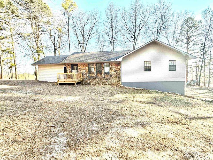 Tucked away on 5.95 acres in Melbourne, Arkansas, this 4-bedroom, 2-bath home offers Ozark Mountain views, abundant wildlife, and a private drive leading to the property. It sits just minutes from schools, shopping, and in-town amenities, while also being near some of the area’s best recreation, including the White River, Knob Creek, and Mill Creek. The home features a spacious 2,628 sq. ft. total, with 1,314 sq. ft. on the main level and 942 sq. ft. of finished space in the walkout basement, plus 372 sq. ft. of unfinished area ideal for storage or future expansion.  The main level includes the master suite, an additional bedroom, and two full baths, while the basement provides two more bedrooms and extra living space for family or guests.  The new deck offers a great place to relax, watch wildlife, and take in the views, while the yard also features a dedicated seating area that’s perfect for guests to gather and enjoy the great Arkansas outdoors.  This property combines acreage, privacy, and small-town convenience, all for $279,500.