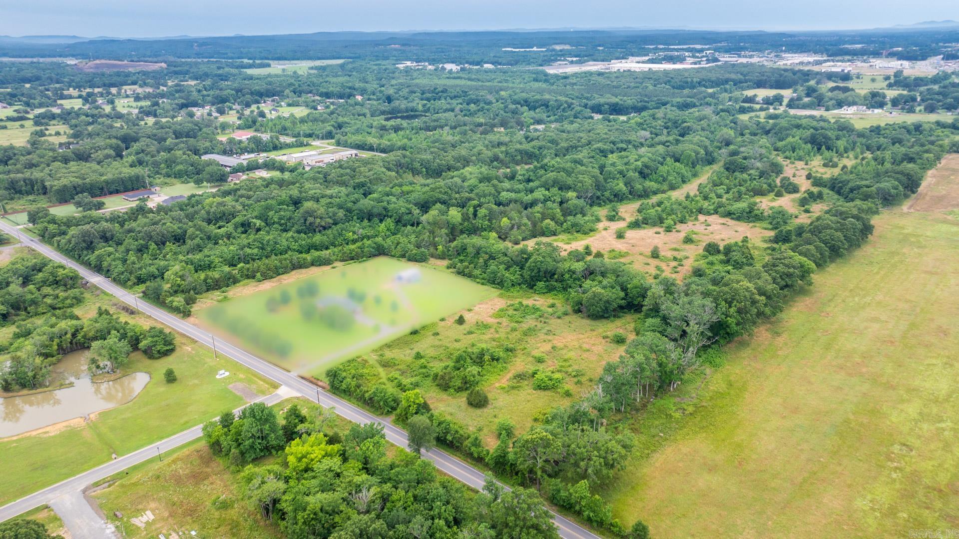 Looking for raw land close to the city limits of Conway? Then look no further. Located close to shopping, restaurants, and the interstate. This property has options for the new owner. Develop into a subdivision, a private oasis to build your dream home, use it for a mini-farm or many other options. Mixture of pastureland and timber with a creek and pond on the property. (AGENTS please see agent remarks)