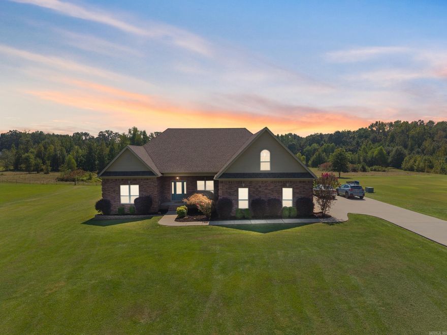 This beautifully maintained home on one acre, with an in-ground pool, offers 4 spacious bedrooms, 2 full bathrooms, and a versatile bonus room that can easily serve as a 5th bedroom or home office. The open floor plan features a formal dining room and a cozy den with a gas fireplace, all under soaring 10–12 ft ceilings that enhance the home's open, airy feel. The kitchen is a chef’s dream with stainless steel appliances, quartz countertops, a breakfast bar, and rich wood cabinetry. Upstairs, you’ll find a large bonus room complete with built-in office space, perfect for remote work or hobbies. A walk-in attic offers the potential for additional square footage in the future. The primary suite features walk-in closets with built-in dressers, a jetted tub, a walk-in shower, and newly updated granite countertops. Additional bedrooms also include walk-in closets, offering abundant storage throughout the home. Outside, enjoy your private backyard oasis with a covered porch and a 20x40 in-ground pool—ideal for entertaining or relaxing. The oversized 3-car garage provides ample space for large trucks or SUVs. Recent updates include: New HVAC, Fresh interior paint, pool liner, and roof!
