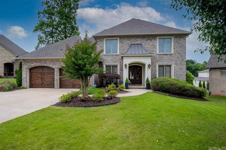 6 Verona is located in a quite cul-de-sac behind the gates of Hickory Grove neighborhood. This Melinda Markus custom home features a spacious floorplan  with 4 BD/3.5 BA , foyer, formal dining room, great room with fireplace, laundry room, nicely appointed kitchen with stainless steel appliances and built in refrigerator, and upstairs den. Covered back patio overlooks beautiful landscaping and water feature. Grounds maintenance is covered by the POA.