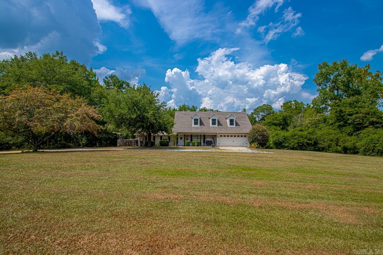 This spacious and beautifully updated property offers the perfect blend of comfort, convenience, and versatilityājust 15 minutes from both Little Rock and the Benton/Bryant area. Inside, youāll find a fully remodeled kitchen, new flooring, and a functional layout ideal for families or multi-generational living. The main level features the primary suite, an additional smaller bedroom along with a half bath and laundry room that includes a built-in office space. Upstairs, 2 generously sized bedrooms share a Jack-and-Jill bathroom with plenty of storage and closet space. Outside, enjoy the peace and privacy of your surroundings with multiple bonus features: a 2,000 square-foot shop that has HVAC and a 1/2 bath that is perfect for equipment, hobbies, or storage. The one-bedroom/one-bath guest house is ideal for extended family or rental income and includes a large closet, laundry, living room and eat in kitchen (appprox 750 SF). There is a relaxing hot tub on the deck, and a storm shelter for added peace of mind. This property checks so many boxes and is full of amenities! Lets schedule your tour!