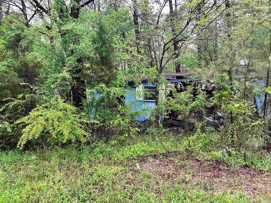 Investment opportunity. Home needs to be torn down, almost 1/2 an acre of land.