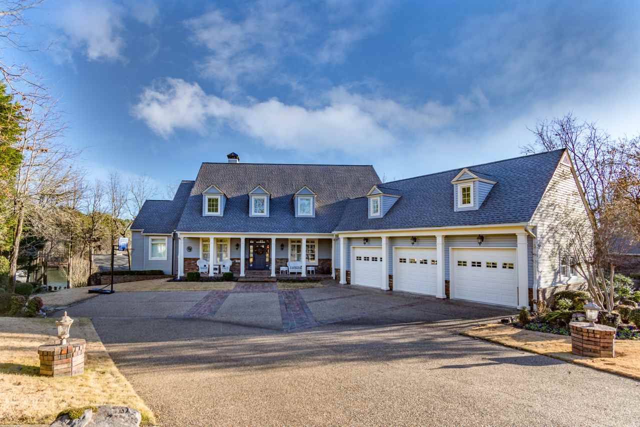 Fabulous custom home built by Bob Christians on Lake Balboa. Quality is everywhere you look in this premier property. All your daily living can be done comfortably on the main level. Guests can be on the lower level with lake views & access or upstairs with game/media room. Multiple living spaces on all three levels easily accessed by elevator. Outdoor living at its finest with extensive Bennet Bros. stone work & water fall, seawall with steps, double boat dock & composite deck. Safe room. Oversized garage