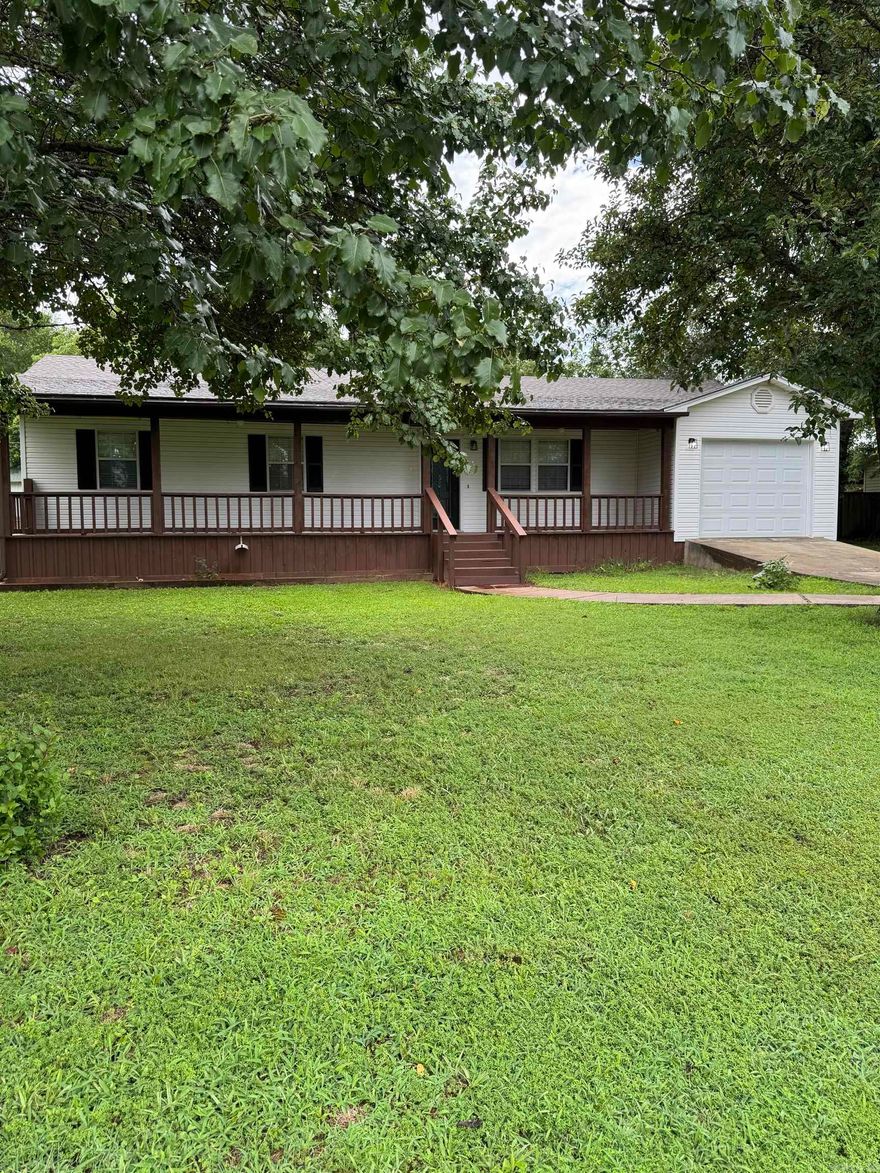 This beautifully remodeled 1,388 square foot home offers 3 bedrooms, 2 bathrooms and sits on an approximately 1/2 acre fenced lot in a peaceful, well-kept neighborhood.  Featuring a brand-new roof modern updates throughout, this home is move in ready. Relax on the full-length front or back porch while reading your favorite book, drinking a nice glass of tea or enjoying your morning coffee. Enjoy the comfort of updated interiors with fresh finishes, an open floor plan and plenty of natural light. The fenced in yard is perfect for families, pets or anyone who loves spending time outdoors.