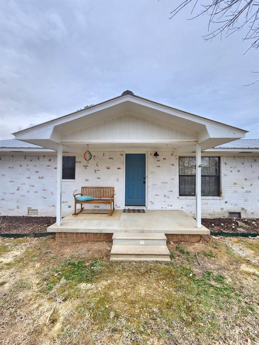 Situated on a spacious one-acre lot, this charming home offers the perfect blend of country serenity and modern amenities. Located in a USDA Rural Development eligible area!  Step outside and enjoy your private backyard oasis, complete with a sparkling pool, perfect for summer relaxation and entertaining. This home is ideal anyone looking to enjoy peaceful country living just minutes from town.  Don't miss this incredible opportunity—schedule your showing today!