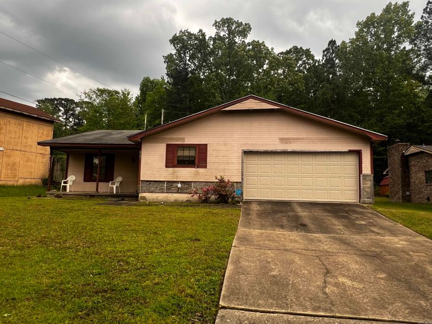 Endless potential in this three bedroom two bath home sitting on a great lot. Roomy sized great room with a cozy fireplace and vaulted ceilings. Nice sized primary suite with a private bath. Formal dining area and more. Roof replaced in 2010. HVAC replaced in 2018. This property is being sold "as is" and will need some updating and repairs.