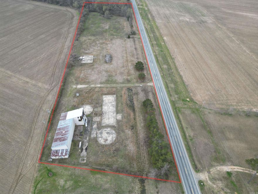 Prime 4.5± Acre Property – Highway 82 E Frontage | No Restrictions  Discover the potential of this 4.5± acre property with direct frontage on Highway 82 East, offering excellent visibility, accessibility, and flexibility for a variety of uses. With no restrictions, this acreage is ideal for commercial, industrial, or residential use, making it a great opportunity for a business site, home place, or investment property.  The property was formerly used as a sawmill and features a large building with approximately 4,500± square feet under roof, providing ample space for storage, workspace, or future improvements. Additionally, there is approximately 11,000± square feet of exterior concrete, perfect for equipment storage, parking, or outdoor work areas.  Additional highlights include a deep water well and multiple power hookups already installed on the property, offering valuable infrastructure already in place.  Whether you’re looking to build your home, start a business, or develop the land, this versatile property provides endless possibilities.  Schedule your showing today and explore everything this unique property has to offer.