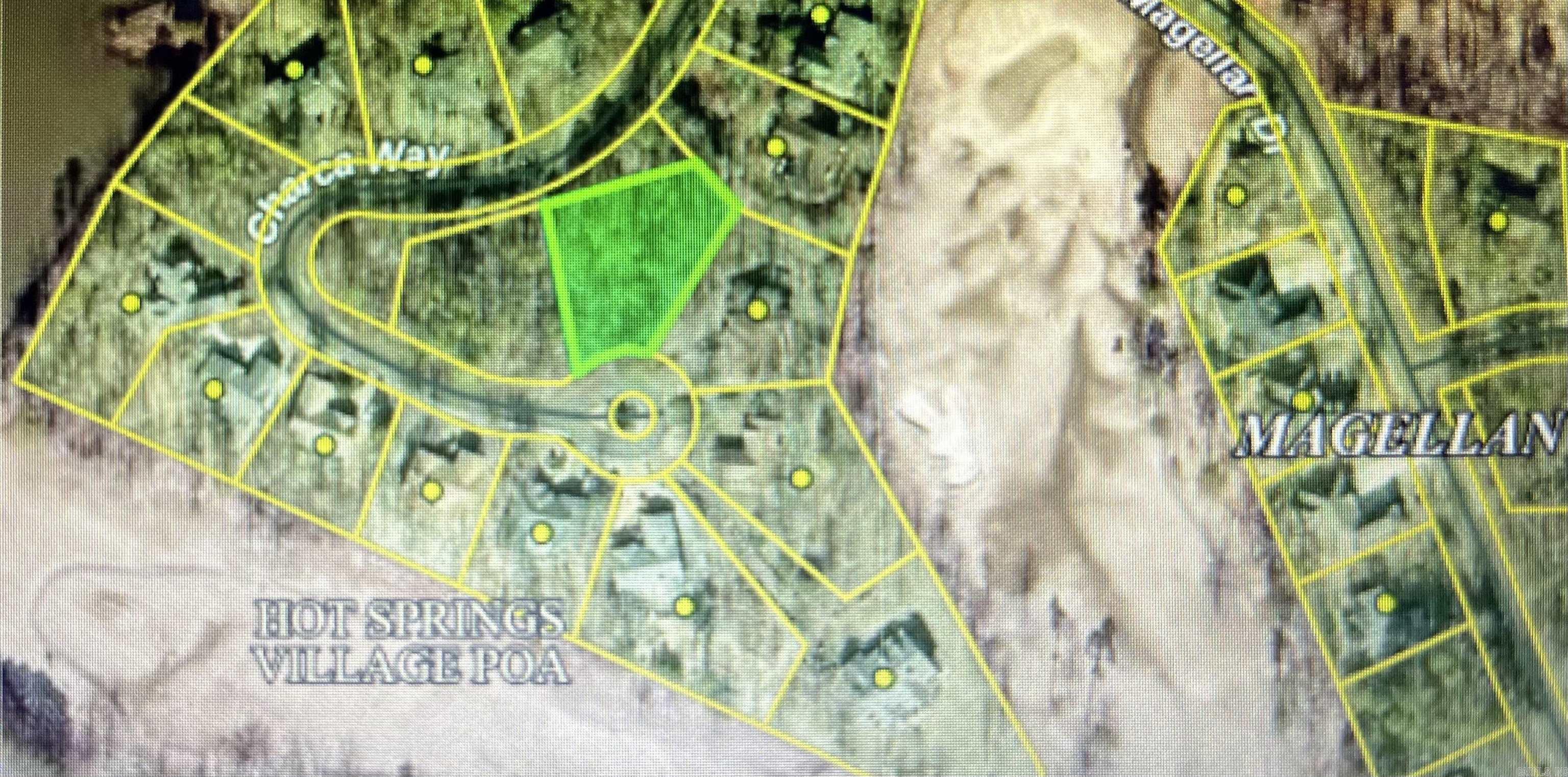 This almost 1/2-acre sloped lot, larger than most, would be great for a walk out build. In a well-stablished neighborhood, near Magellan Golf Course, it would be great for a new build, second home, or vacation rental in beautiful Hot Springs Village. With it's 9 professionally designed, year-round golf courses, 11 lakes, miles of walking, hiking and biking trails, pickleball, and many other activities, come experience "Village" life and all it has to offer. Come live the life you love.