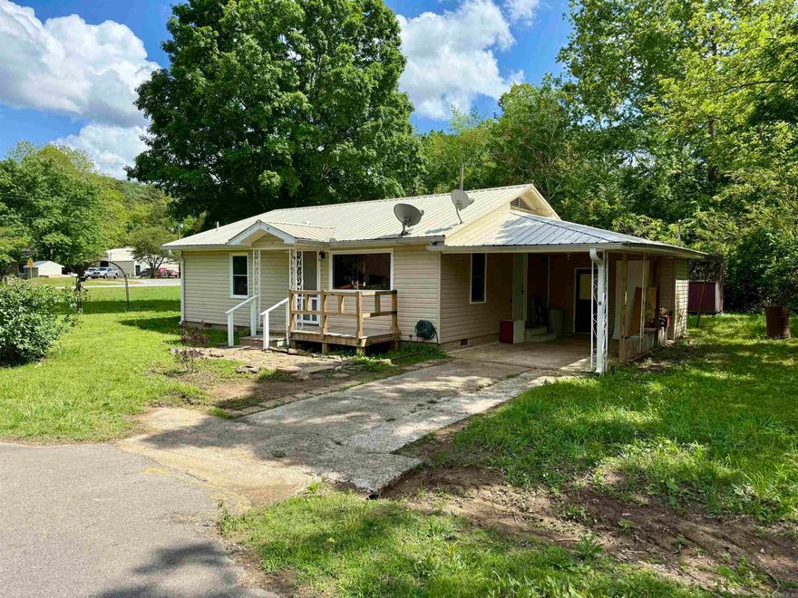 This charming 3-bedroom, 1-bath home in the heart of Heber Springs is perfect for first-time buyers or a great rental investment. It features hardwood floors throughout most of the home, a newer metal roof, siding, and windows. Recent updates include fresh paint, new fixtures, new landscape lighting, a brand-new water heater, and completed foundation leveling for peace of mind. Enjoy the large, serene yard with a creek—your own peaceful retreat just steps from your door. With its prime location and recent upgrades, this home is move-in ready and full of potential. Have the convenience of being in town but close to multiple access to points to Greers Ferry Lake and the Little Red River. Large corner lot, plenty of space for a shop and or additional living quarters. Take a look.