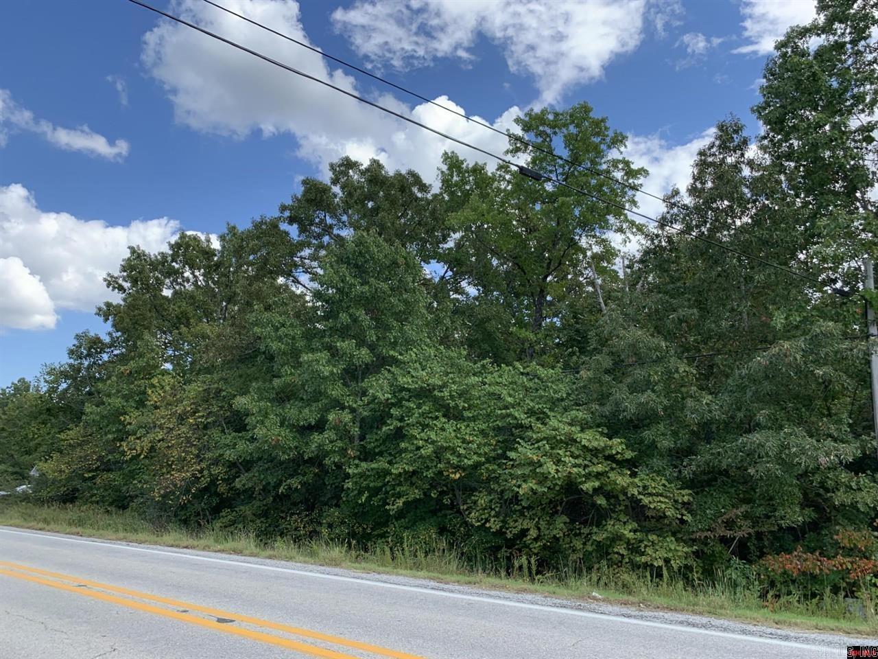 Wooded land with Hwy frontage on Hwy 178 in Lakeview Arkansas. Lot lays fairly level. Close to Bull Shoals Lake and the White River. Property has electric access and available to City Water. $10,000