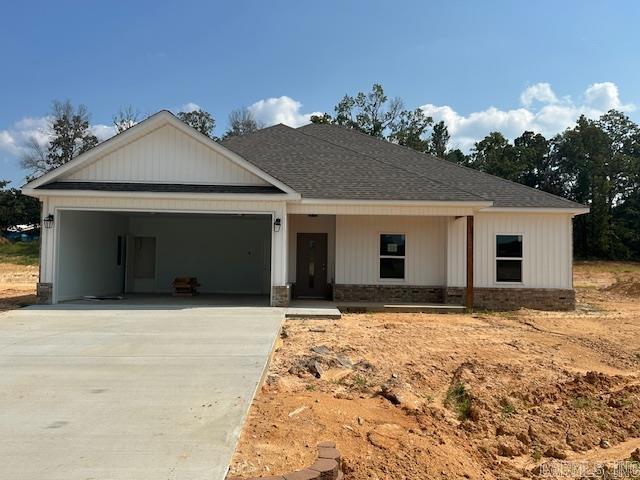 Experience serene living in this charming 4-bedroom, 2- bathroom home located in Winchester Estates Subdivision. This charming new construction sits on 1.23 acres backing up to tranquil woods where you can enjoy watching the wildlife from your back porch. Home features an open floor plan, walk-in pantry, and ss appliances. Stepping into the primary suite, you'll find a spacious walk-in closet, tile walk-in shower, his-and-hers vanities and a soaking tub. Bauxite school District!! There's still time to pick some of your fixtures and finishes if you hurry!! Schedule your showing today to explore all this new subdivision has to offer!!