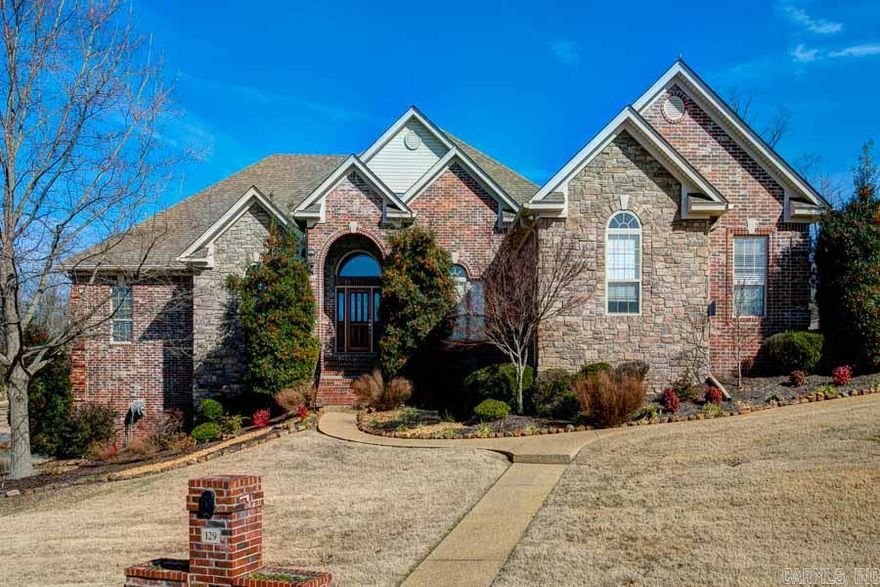 Unbelievable! $140,000 in upgrades and updates. Perfect setting- half acre lot on pond and walking trails. Outdoor paradise w/ flagstone, large Koi pond w/waterfall and arbor. 4 Living areas, hardwoods and sun room. Chef's kitchen- 6 gas burn Viking, granite thru out, see thru fireplace. Office has "granicrete" floor, mini kitchen, granite counters. Versatile floor plan w/ 2 BRs on main level and hearth. Showcase in Osage- golf cart ride to driving range and club.