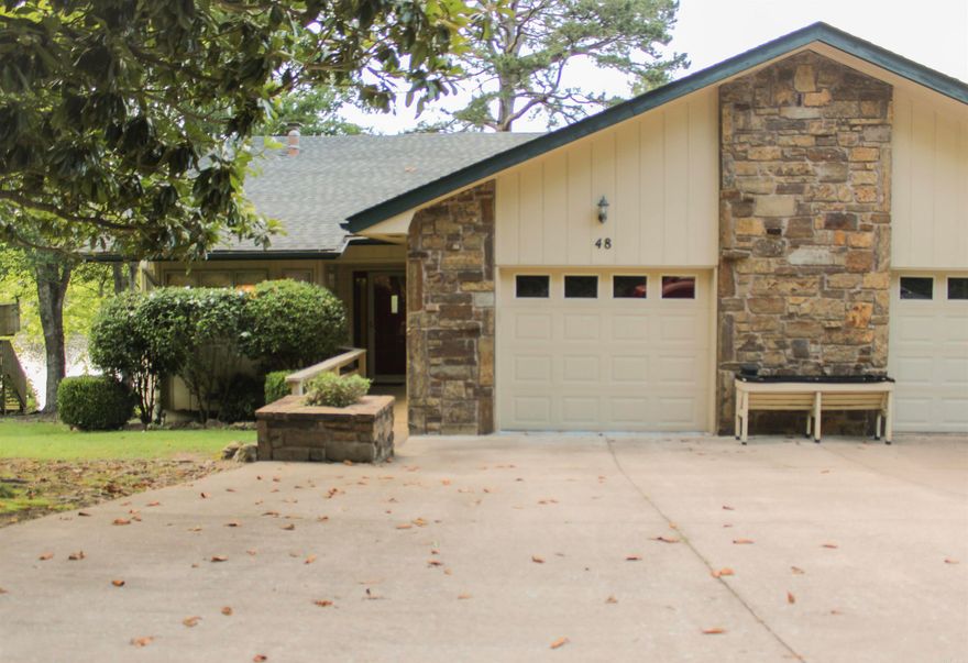 Enjoy lakefront living in this cozy 2BR/2BA townhouse located in the heart of Hot Springs Village the largest gated community in the U.S.! Perfect for downsizers or those seeking a peaceful retreat, this home offers a flexible and spacious layout with a living room, a separate den for relaxing or working from home, and a bright sunroom with serene views of the lake. Recent updates include a brand-new HVAC system installed in 2024 for year-round comfort. Step outside to enjoy lakeside strolls, or take advantage of the incredible amenities Hot Springs Village has to offer from golf courses and nature trails to lakes and community events. This low-maintenance lakefront gem blends convenience, comfort, and charm in a secure, vibrant community. Don't miss your chance to live the lake life!