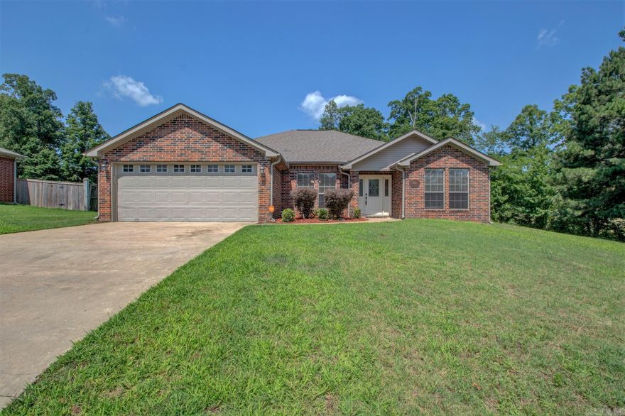 Gorgeous All Brick Home in the Silver Leaf Addition of White Hall! This beautiful home is situated on 1.0 acres of land and is nestled inside a cul de sac.  Home features a split level floor plan with formal dinning room and large family room with gas log fire place. Tray ceilings in both dinning room and family rooms! Kitchen features all stainless steal appliances, breakfast bar and beautiful cherry wood finished cabinets. Large laundry room! Master bedroom features a jetted tub, walk-in shower and walk in closet. Out back is a covered patio! Home is just minutes away from White Hall Schools, restaurants and shopping. Carpet allowance to be provided with acceptable offer! Come see!
