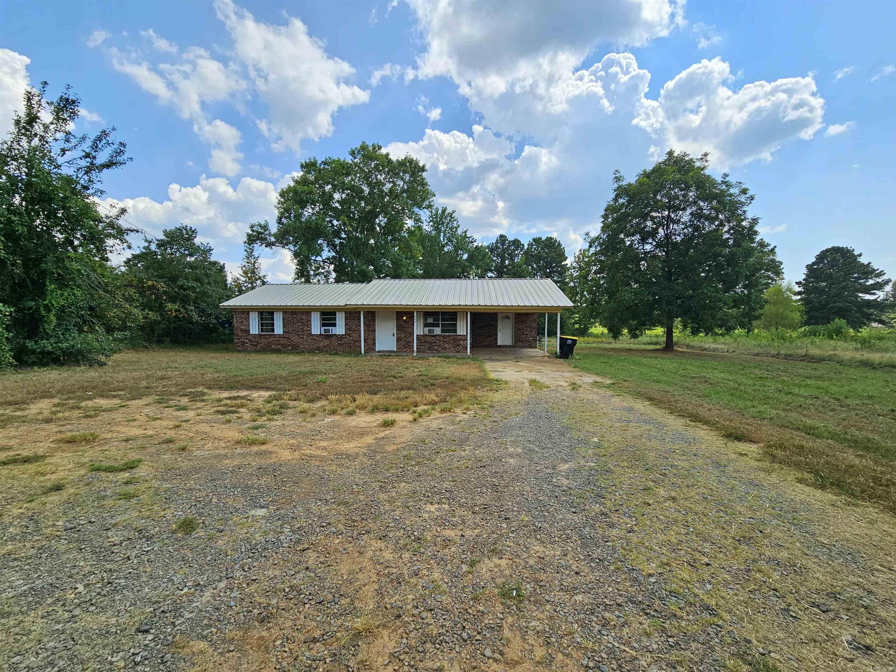 Check out this great starter home! This 3 bedroom home has a large living room, good size dining area and large laundry room. This home sits on a large, private 1.9 acres and is located close to schools. This would make the perfect starter home or investment property. Agents read confidential remarks.