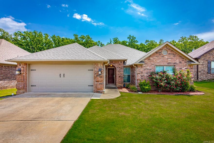 Amazing entry point into a neighborhood with many larger homes!  Great find for Millers Glen in Sherwood.  This all brick split bedroom 4 bed/2 bath home, on a flat lot on a low traffic street backs up to green space.  Step inside to a home with lots of attention to detail from its soaring ceilings, elevated trim, arched doorways - there is much to love!  Check out the covered patio out back and the extra large laundry room.  Granite counters in wet areas and hardwoods and carpet throughout.  New roof:  2022.  Agents see remarks