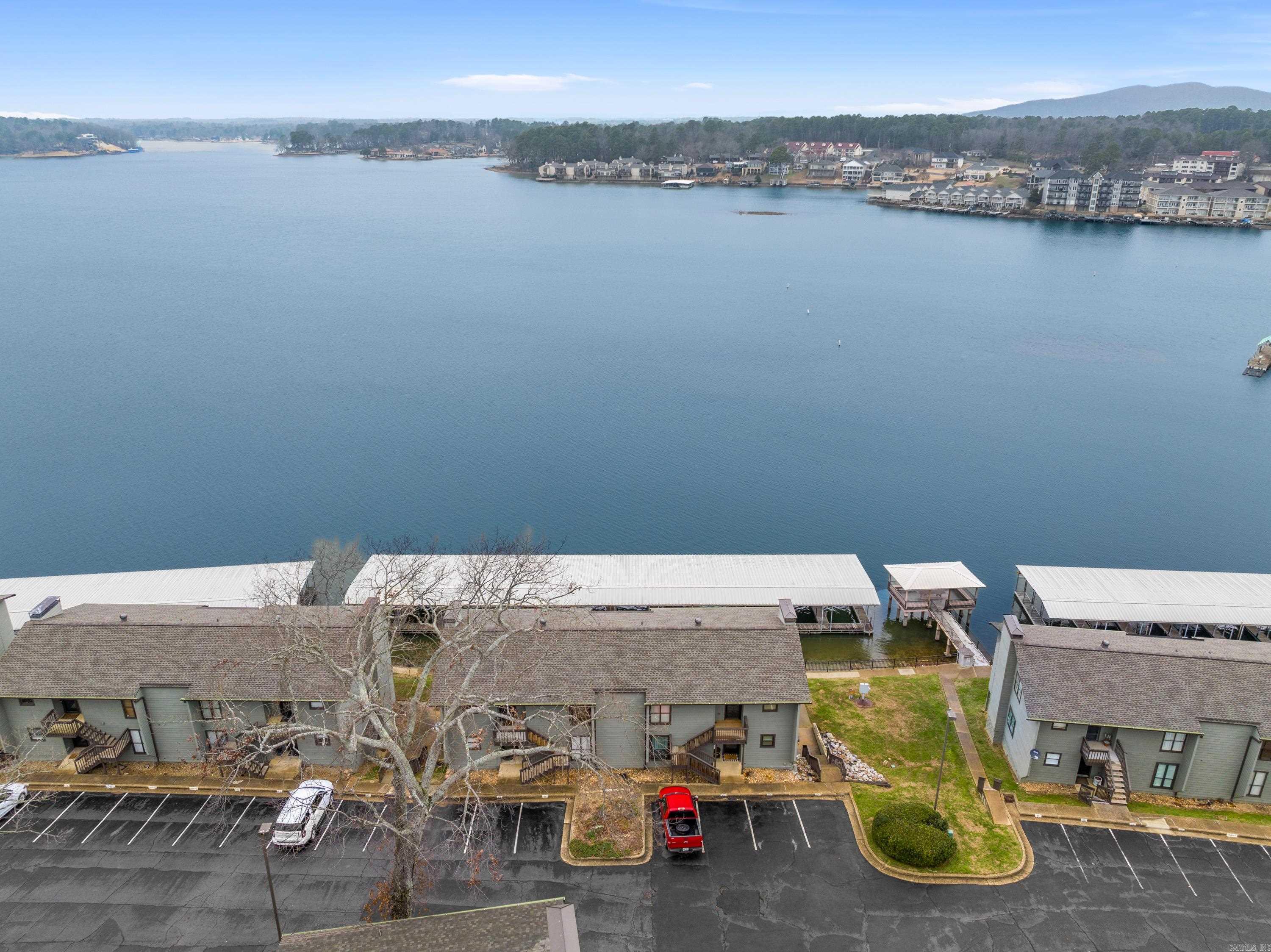 Luxurious Waterfront Living: Fully Furnished 2-Bedroom, 2-Bath Condo with Covered Boat Slip Discover the perfect blend of comfort, convenience, and investment potential with this fully furnished 2-bedroom, 2-bath condo. Situated in a highly sought-after waterfront community, this turnkey property is an ideal short-term rental or vacation home, offering all the modern amenities and leisure facilities you could desire. Fully furnished with stylish décor, this condo is move-in or rental-ready. Every detail has been considered to create a welcoming and comfortable environment for guests or owners alike. Nestled in a picturesque waterfront setting, this condo offers breathtaking views and immediate access to recreational activities. The sought-after location provides a tranquil escape while remaining conveniently close to local attractions, dining, and shopping. This property is a proven short-term rental performer, offering a lucrative opportunity for investors. Its turnkey status and desirable features ensure a seamless transition into the rental market.