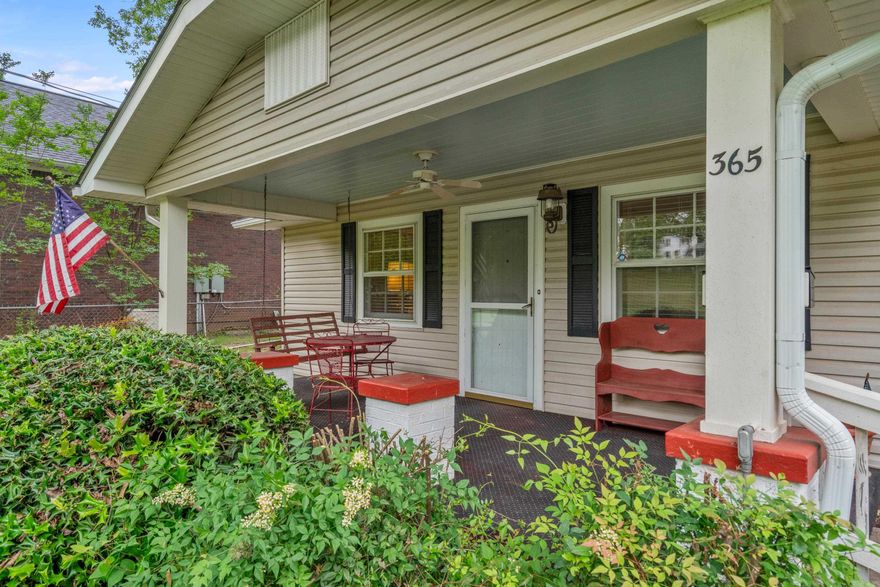 Enjoy Lake Hamilton living in this charming 2-bedroom, 2-bath home with approximately 75 feet of waterfront and sweeping views, on a level lot. With approximately 1,914 square feet, this property offers multiple indoor and outdoor spaces to relax, entertain, and take in the natural beauty. The kitchen features a gas range and flows into a spacious dining area along with a wet bar/butler’s pantry. Wood ceilings or 9' heights in select rooms add architectural interest and warmth. Outdoor highlights include a screened porch overlooking the lake, a covered front porch, and a fenced backyard with terraced stone walls ideal for gardening. A covered boat dock, stone seawall, and dedicated storage buildings for lake toys, lawn equipment, or workshop use enhance the property's functionality. One-car garage. Located on the lake yet minutes to town, this home offers the perfect balance of serenity and convenience.