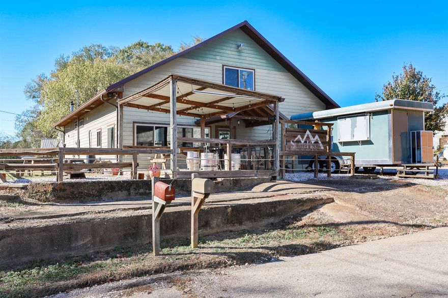 Discover a one-of-a-kind opportunity with this fully equipped town brewery and food truck setup! Designed for efficiency and creativity, this property includes a complete brewing system featuring a mash tun, kettle, fermenters, carbonation tanks, and keg washer. The temperature-controlled fermentation and storage area, along with a spacious walk-in cooler, ensure quality from start to finish. The tap room combines style and function with polished stained concrete floors, rich walnut counters, and 9-foot ceilings. An 8-tap wall draft system is in place and ready for service. Additional highlights include office space, extra storage, and a welcoming outdoor area with picnic tables, a fire pit, sandbox, and string lighting—an ideal setup for hosting events or relaxing between batches.