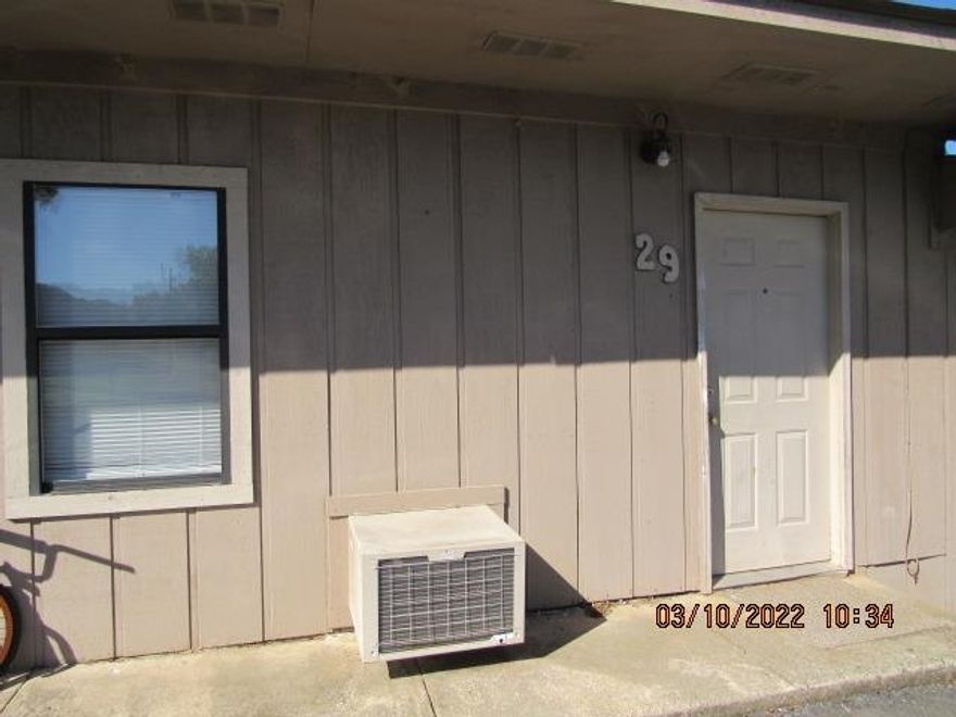 Well maintained 2 bedroom duplex, range/oven & refrigerator, new carpet in LR & bedrooms, new vinyl in bathroom & kitchen, window AC/Heat unit, trash & lawn care provided, all electric, new kitchen cabinets, coin operated laundry facility on site. No Pets allowed.