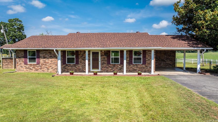 Are you looking for a place to call home away from the hustle and grind of town? If so, this home is the perfect find! Come sit outside and enjoy the peace and quiet that surrounds this adorable, well taken care of brick home. It features updated bathrooms, new windows, new roof, flooring and paint. There is extra space for storage in the outside storage shed as well as the attic space. Perfect home waiting for it's perfect new owners!