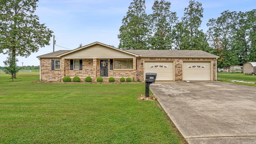 Beautiful home located in the heart of Marmaduke within walking distances of the school and park. This 3 bedroom 2 bath home has all you need!  The large covered deck and spacious back yard is perfect for entertaining and hosting family get togethers.This home also has a large insulated 20x20 workshop, wired for a generator and a new roof installed in April.