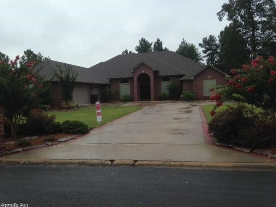 Beautiful custom built home situated on an acre lot. Home offers 4BR/3.5BA, open and split floor plan and an amazing master suite! Granite, tall ceilings, lots of crown moulding, outdoor kitchen, covered patio, vinyl fencing, and hardwood flooring. Must see to appreciate.