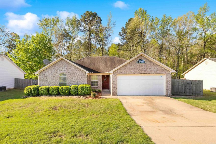 Welcome to this move-in ready 3-bedroom, 2-bath home that blends charm, functionality, and thoughtful design. You'll immediately notice the great curb appeal and well-maintained exterior that set the tone for what’s inside.   Step into the main living area and take in the rich Brazilian hardwood floors that add warmth and elegance throughout. The open-concept layout seamlessly connects the kitchen, dining, and living spaces, with a spacious great room featuring an oversized gas log fireplace—ideal for both relaxing evenings and easy entertaining.   Each of the three bedrooms includes a generous walk-in closet, and the primary suite offers a well-appointed bathroom with a large vanity and plenty of storage.   At the back of the home, a storm door lets in abundant natural light and leads to a large deck—perfect for enjoying your morning coffee, outdoor dining, or simply unwinding while taking in the peaceful backyard view.   This home is move-in ready and has been thoughtfully maintained throughout. Don’t miss your chance to make it yours!