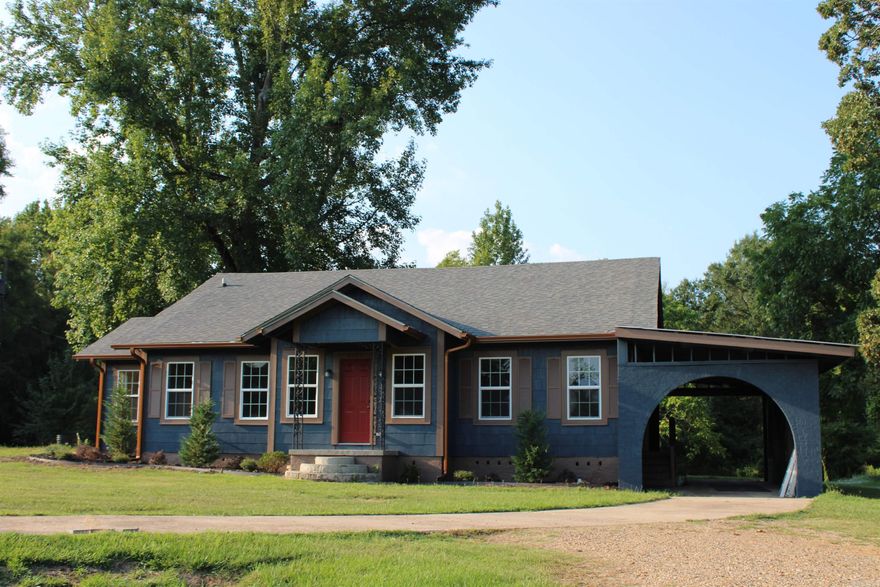 2.5 acres inside the city limits of Texarkana. Windows, stove, water heater new as of about 2021. Dishwasher and roof new 2022. 2025 remodel including two new mini-splits upstairs, painted inside and out, new carpet, refurbished deck and landscaping. The master bedroom features a woodburning fireplace, walk-in closet and a sunroom (siting room). From the living room is a room to the left that could be used for a 5th bedroom or an office. On the opposite side of the living room is a den or multipurpose room. The kitchen is a unique design featuring wrap around cabinets into a breakfast area. The other side of the kitchen feeds into a formal dining room. This is a beautiful 1940 style home.
