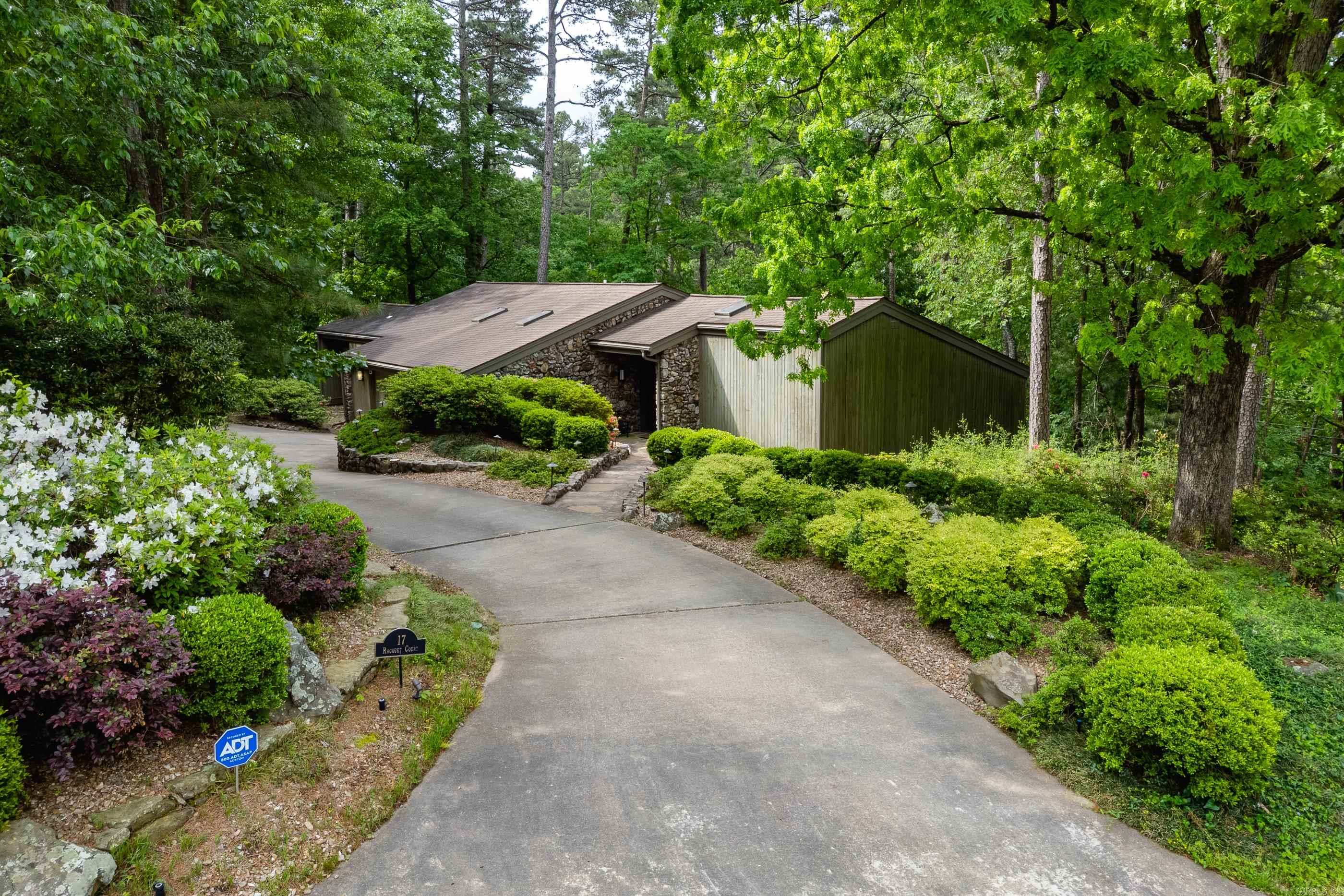 Stunning, architecturally designed, one-owner home in Foxcroft. This contemporary style home is situated at the end of the cul-de-sac and updated throughout. Designed to live as a one-level, the main level has vaulted ceilings in all rooms and an abundance of skylights provides a warm open feel. Separate primary suite and formal living and dining areas, family room and two bedrooms all on main level. Lower level features a den with built-in bookshelves, cabinets and desk, full bath and lots of storage space that could become a 4th bedroom. Wooded backyard does have a fenced area accessible to home on a portion of lot. Whole house generator.