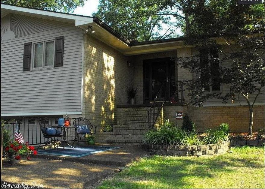 Nice brick home with hard would floors, privacy fence in back yard, sun porch, full basement and many more features.