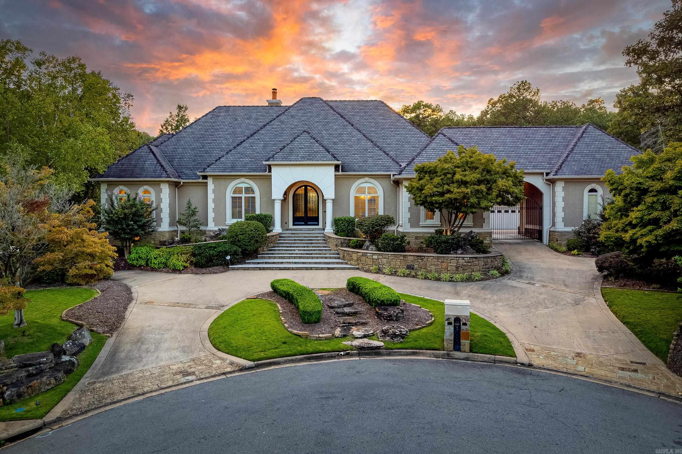 Welcome home to this private and secluded estate nestled away in a quiet cul-de-sac in the prestigious neighborhood of Valley Falls Estates, offering amenities that no other home offers. This astounding property sits on over an acre with incredible views of the magnificent backyard. The main home is 6,033 square feet plus a guest home with 647 square feet. This masonry stucco and rock home was custom built for the original owners. The current owners thoughtfully and meticulously renovated the home in 2020 with acclaimed interior designer Angelilne Guido Hall and builder Bradford Harris. Renovations include an incredible chefās kitchen, updating of all bathrooms with high-end fixtures, new iron doors including a telescoping patio door creating a movable glass wall, new hardwood flooring throughout, custom wallpaper and new paint along with a truly a magnificent hardscaped backyard! The backyard offers an abundance of outdoor entertainment areas and sun-soaked terraces that consist of a large covered porch with fireplace, unite pool with new plaster and tile, unbelievable chef's outdoor kitchen and pond with stocked fish. Four car garage, Control 4 smart home automation plus more!