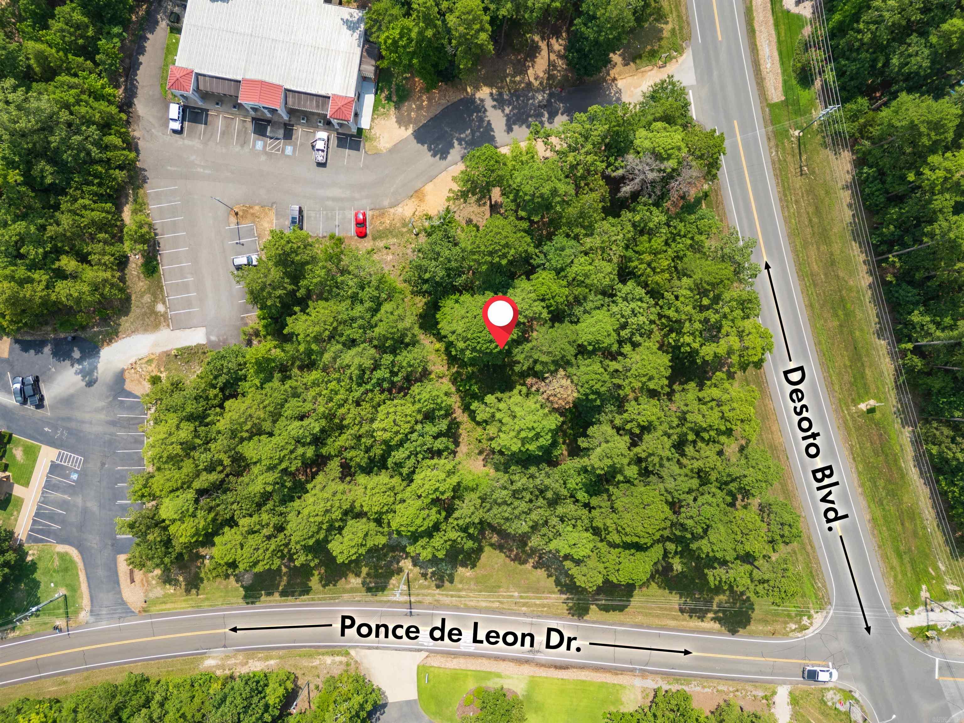 ESTE CENTER,HOT SPRINGS VILLAGE,AR. For S Este Commercial: Unimproved 1.03 acres. Corner Desoto and Ponce de Leon, the most desired upscale area of this multi-billion dollar 26,000 acre. Gated community in the scenic Ouachita Mountains. Site is in the midst of banks, medical, and professional buildings. Great opportunity for additional high end development.